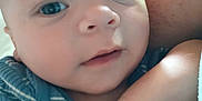 Kamron joined the competition — help win amazing prizes! baby, blue_eyes, child, close_up, clothing, cute, face, fist, hand, human, infant, intimate, newborn, person, portrait, resting, skin, soft_light, striped, tender