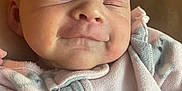 Ellie is registered to the contest to win money with this photo: baby, infant, face, smile, closed_eyes, sleeping, fleece, clothing, koala_print, cute, soft, cozy, child, portrait, newborn, skin, head, cheeks, peaceful, indoors