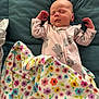 Ellie joined the competition — help win amazing prizes! baby, sleeping, onesie, koala_pattern, blanket, floral, colorful, quilt, bed, peaceful, infant, soft, cozy, child, cute, rest, indoors, comfort, pajamas, newborn