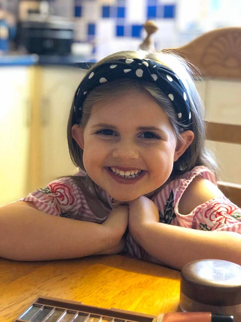 Melodie is registered to the contest to win money with this photo: child, fun, hair_accessory, happy, headband, headgear, joy, person, smile, toddler