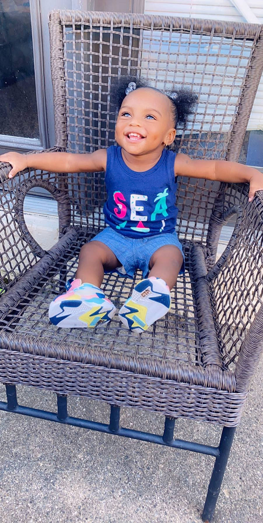 Leiah is registered to the contest to win money with this photo: baby, baby_toddler_clothing, blue, child, child_model, fun, furniture, joy, leisure, people, person, play, playground, recreation, sitting, smile, toddler, vacation