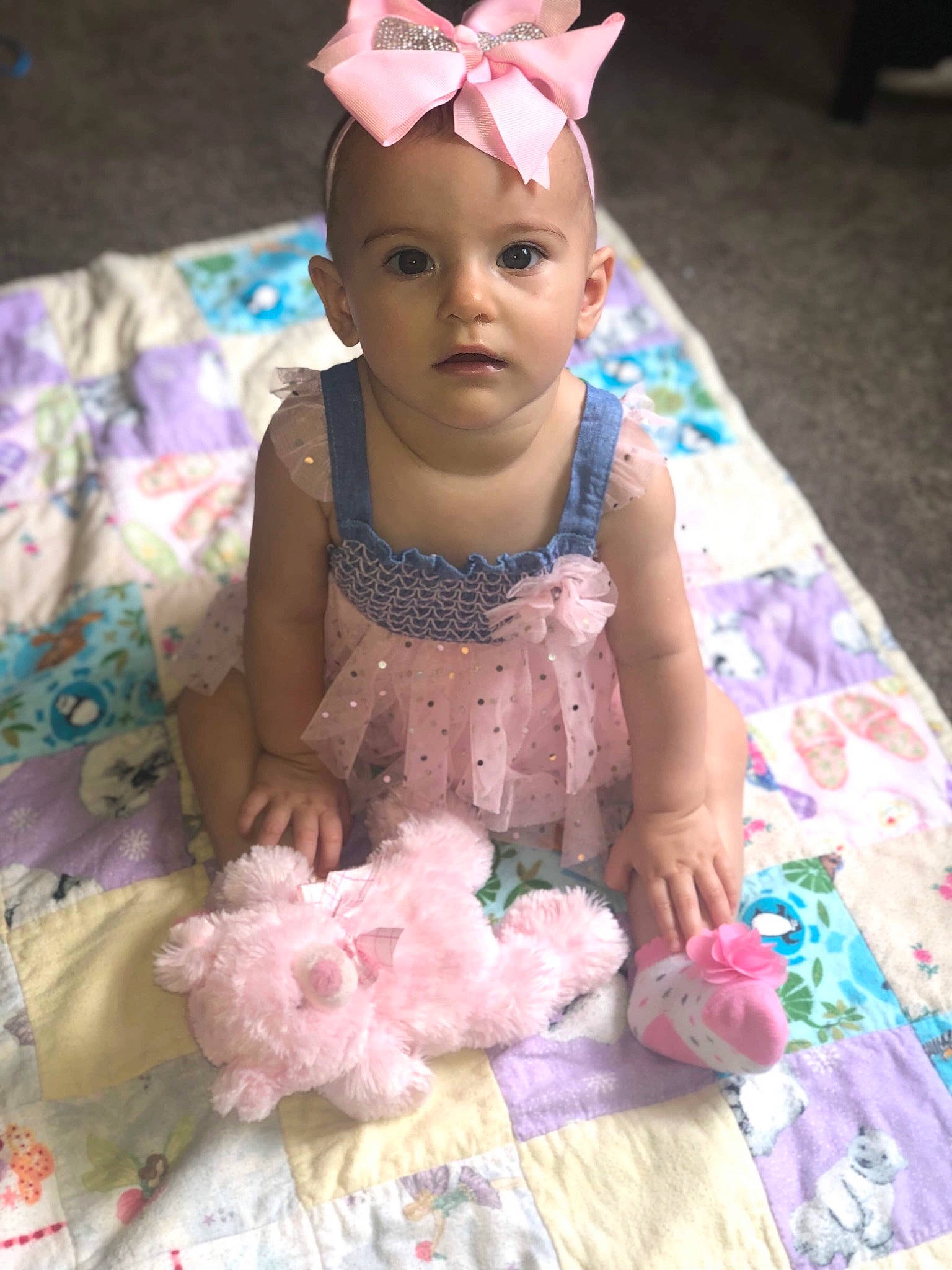 Emorie is registered to the contest to win money with this photo: baby, child, costume, dress, fashion_accessory, hair_accessory, head, headband, headgear, headpiece, person, petal, pink, textile, toddler