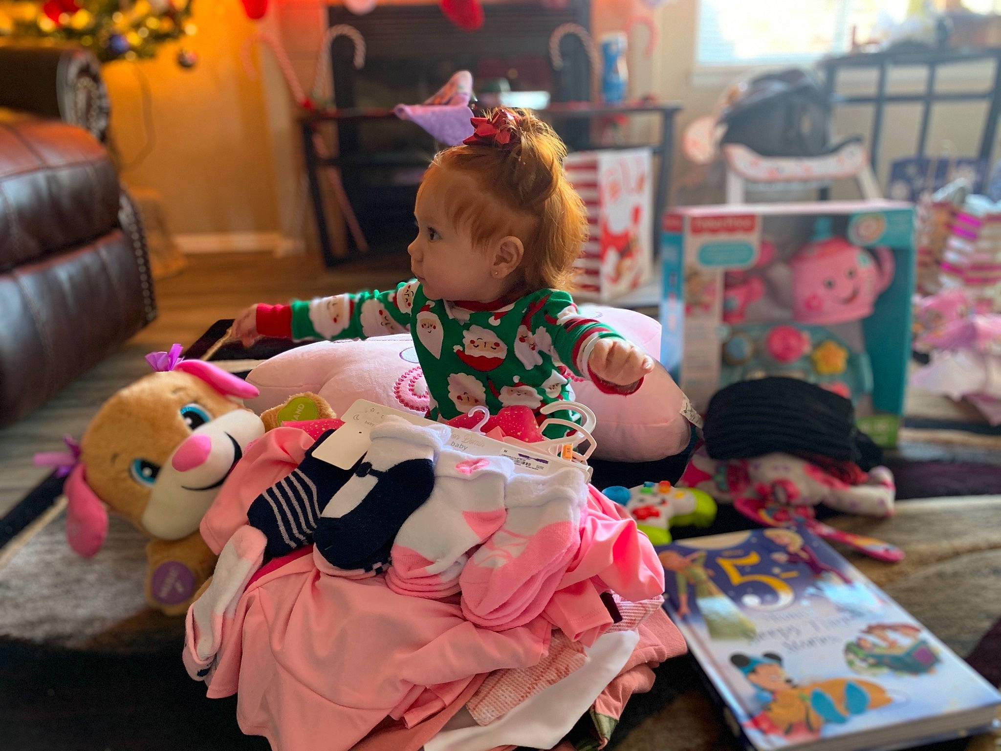 Aliah is registered to the contest to win money with this photo: baby, baby_playing_with_toys, baby_products, baby_toddler_clothing, baby_toys, child, couch, living_room, person, pink, play, plush, room, shelf, stuffed_toy, toddler, toy