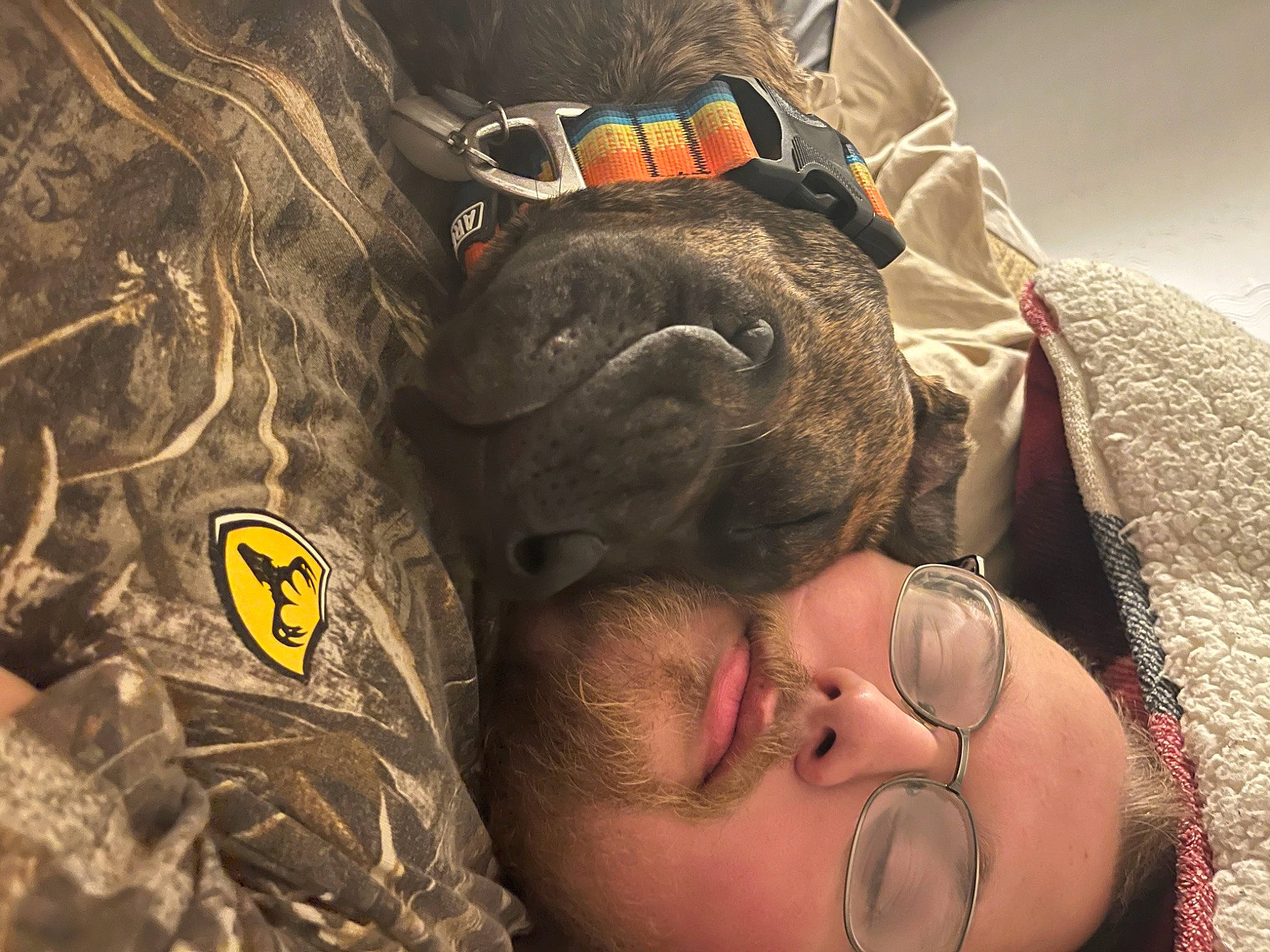 Milo Junior is registered to the contest to win money with this photo: army, audio_equipment, eyewear, facial_hair, fun, glasses, hat, marines, military_camouflage, military_organization, military_person, military_uniform, pattern, personal_protective_equipment, skin, soldier, sunglasses, temple, vision_care, wrinkle