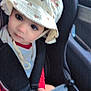 toddler, child, car_seat, hat, bib, seatbelt, car_interior, safety, young_child, person, cute, baby, clothing, face, portrait, seat, looking, hands, red_shirt, travel