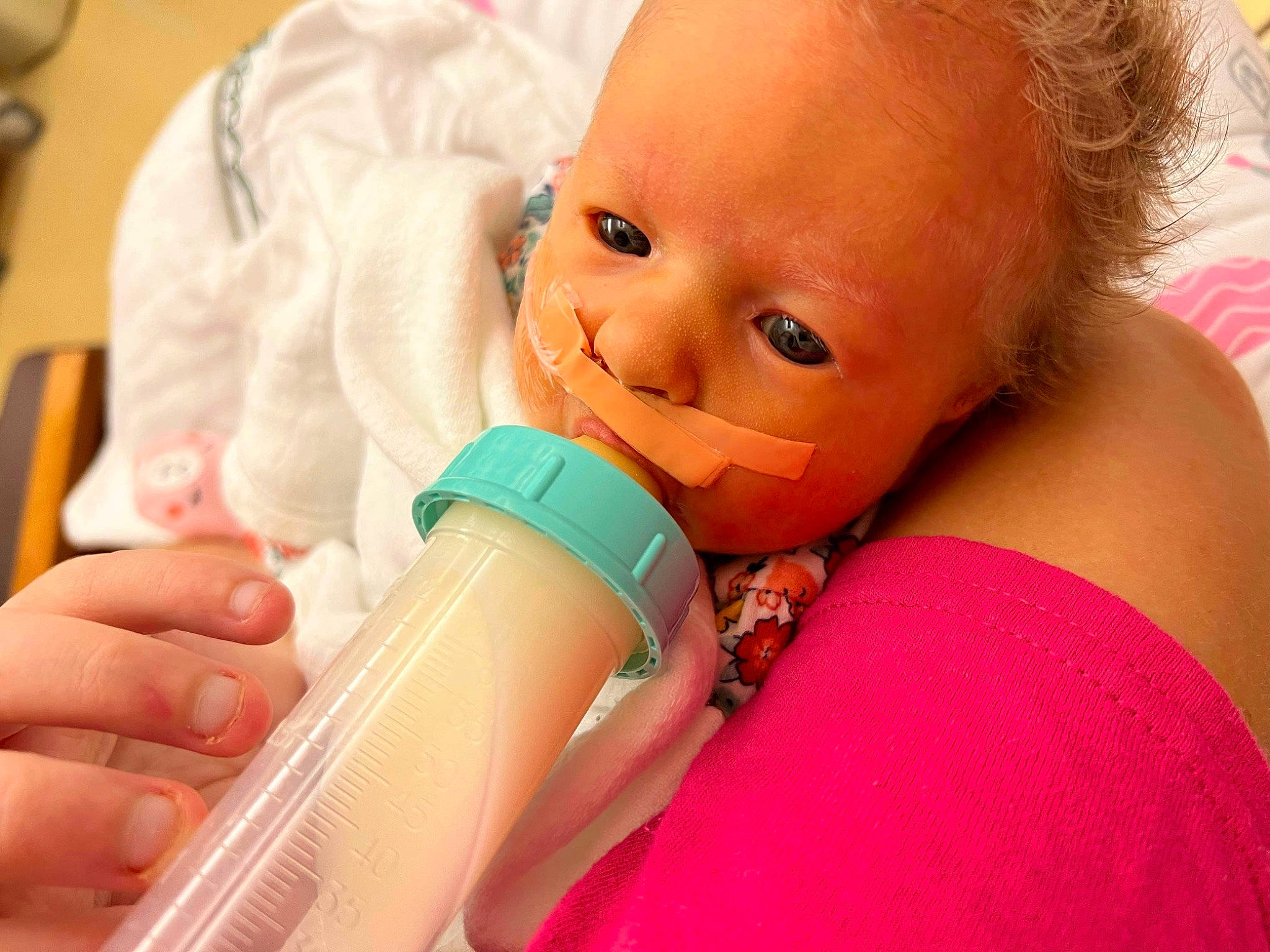 Bexley joined the competition — help win amazing prizes! baby, baby_bottle, baby_products, baby_toddler_clothing, cheek, child, comfort, drinkware, eyelash, finger, gesture, happy, nail, nose, person, plastic_bottle, service, skin, thumb, toddler