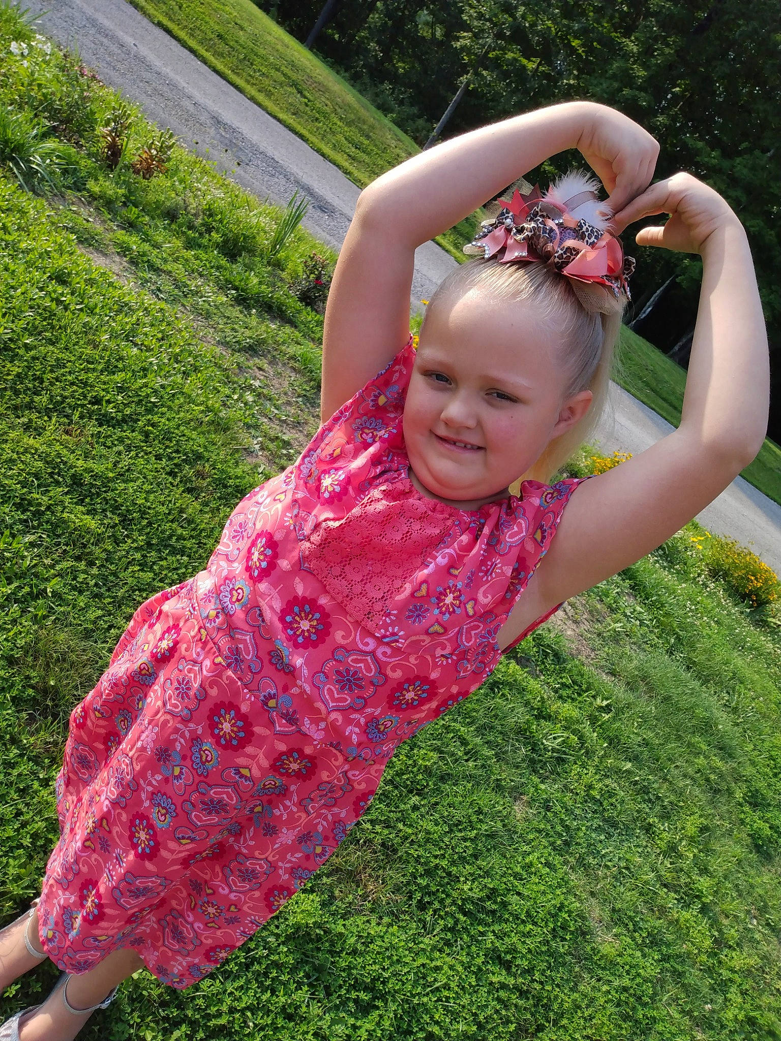 Zoey joined the competition — help win amazing prizes! baby_toddler_clothing, botany, fun, garden, grass, grass_family, grassland, groundcover, happy, joy, lawn, leaf, leisure, magenta, people_in_nature, person, pink, plant, shoulder, smile