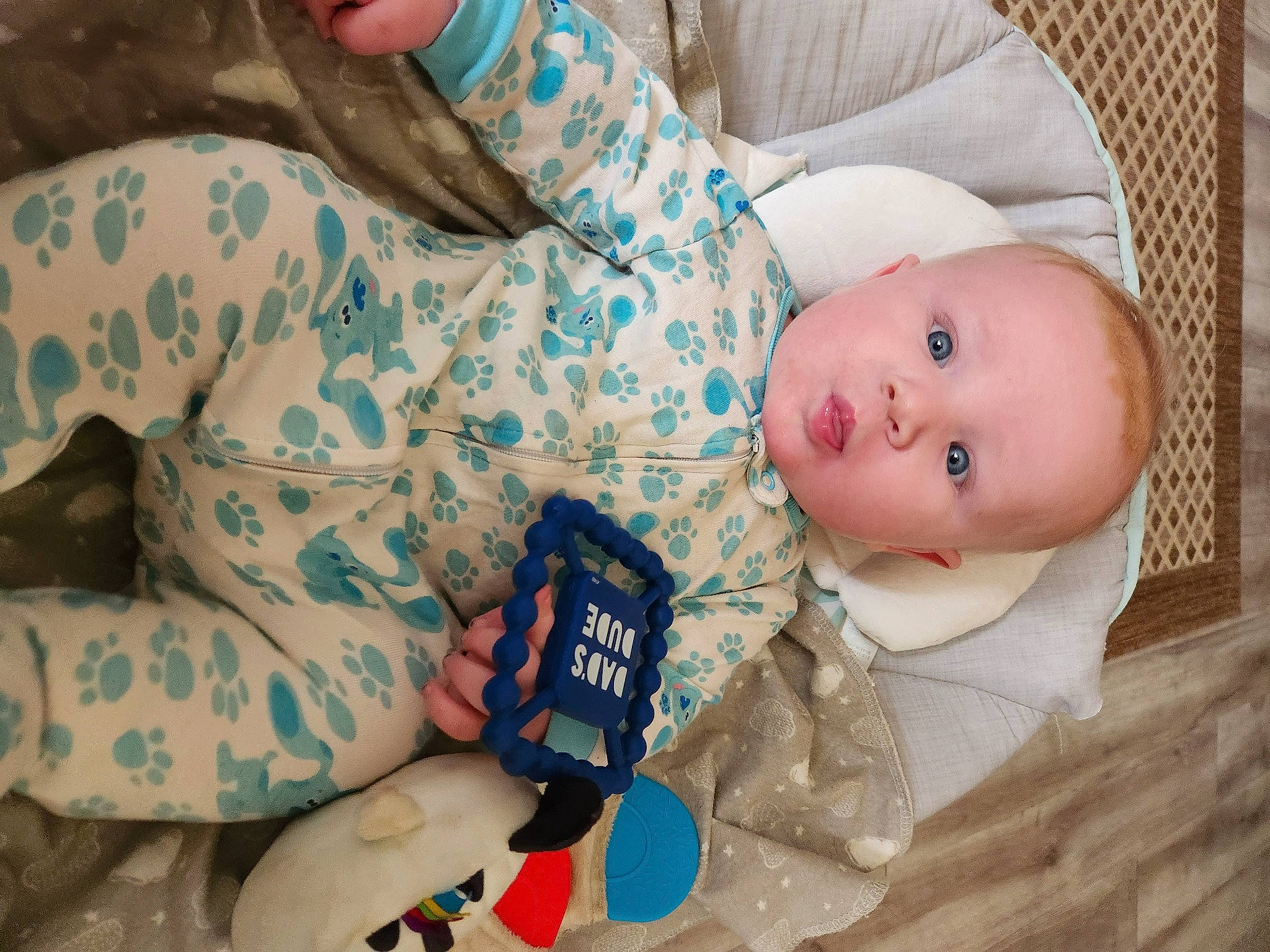 Kalel is registered to the contest to win money with this photo: baby, baby_products, baby_sleeping, baby_toddler_clothing, child, comfort, elbow, finger, hand, human_body, linens, nail, pattern, person, room, sitting, skin, sleep, sleeve, toddler