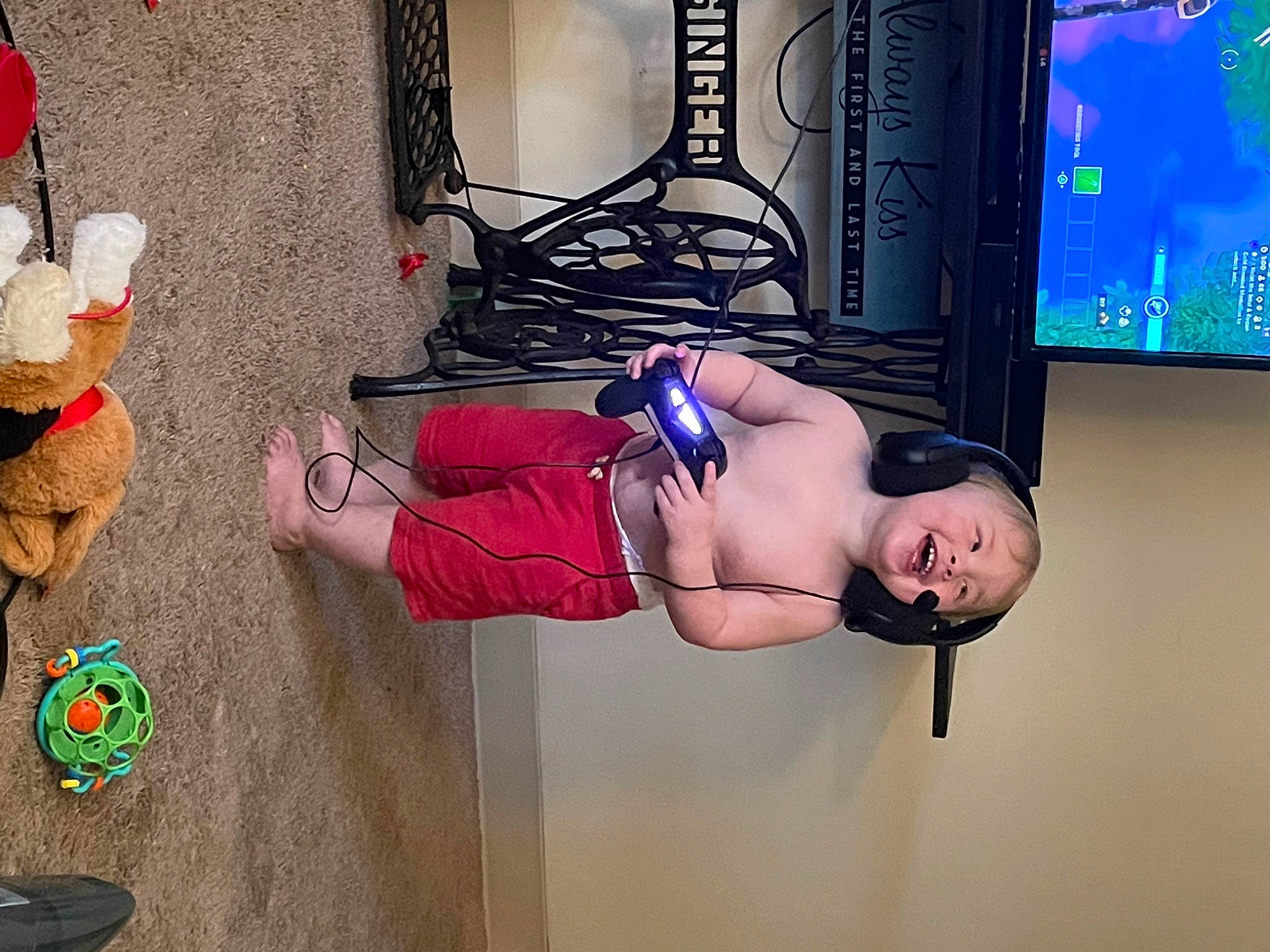 Kian joined the competition — help win amazing prizes! abdomen, barechested, chest, child, display_device, elbow, fun, human_body, human_leg, joint, knee, leg, leisure, person, room, sandal, shoulder, thigh, toddler, toy