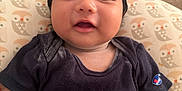 Albert joined the competition — help win amazing prizes! baby, bed, blanket, child, clothing, cushion, cute, face, fist, hand, head, indoor, infant, owl_pattern, person, portrait, shirt, skin, smile, young_child