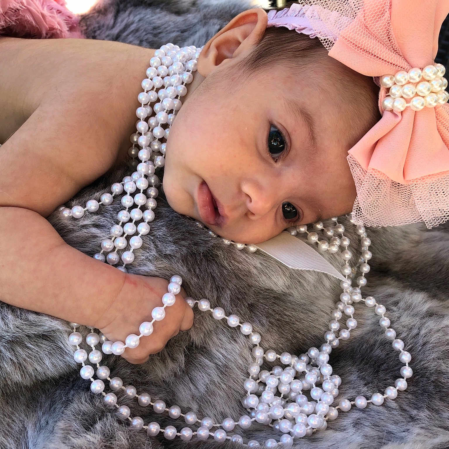 Mazikeen joined the competition — help win amazing prizes! baby, beauty, cheek, child, crochet, design, face, forehead, hair_accessory, hand, head, headgear, human, lip, pattern, pearl, pink, product, skin, toddler
