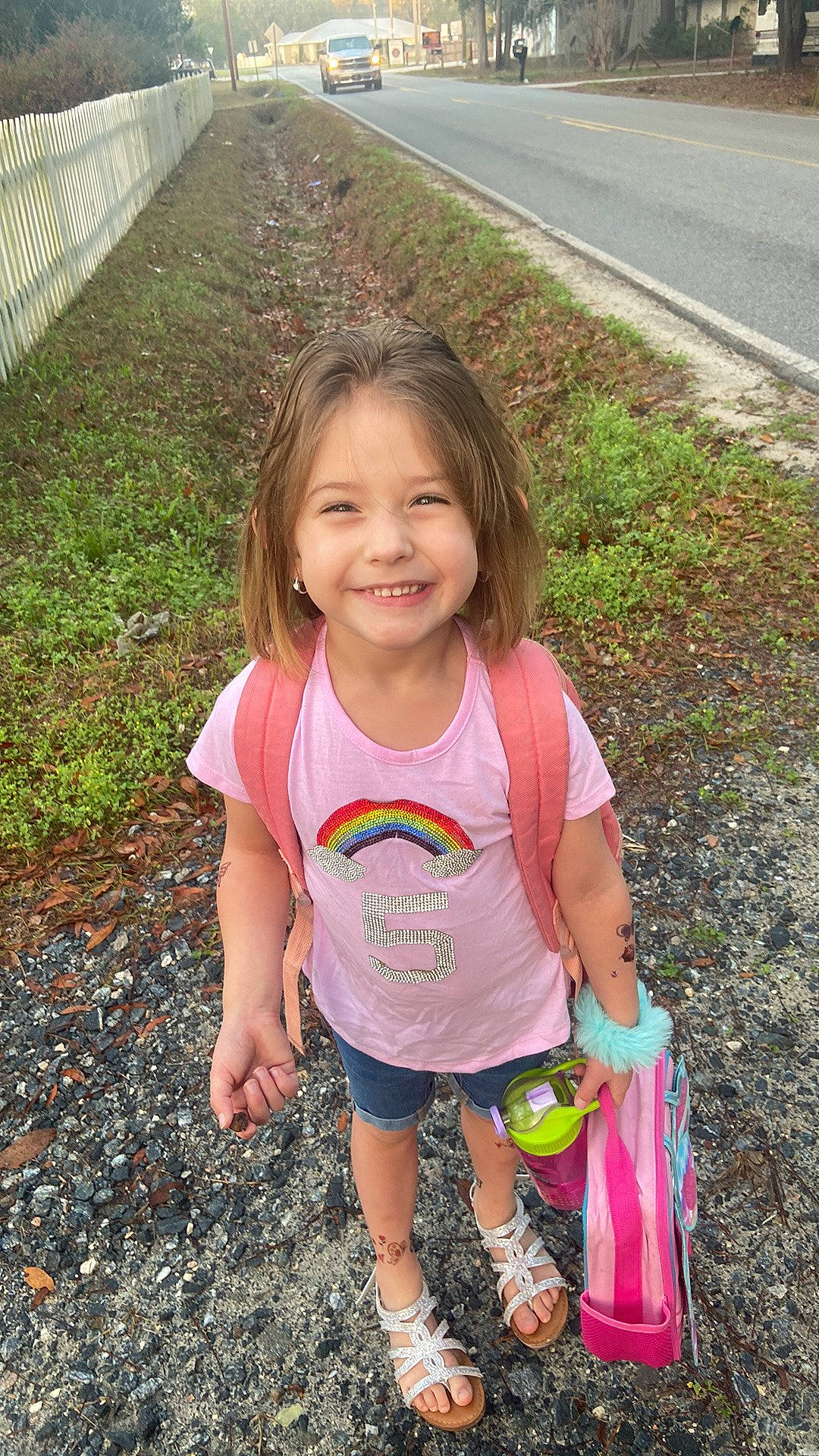 Aubry is registered to the contest to win money with this photo: asphalt, baby_toddler_clothing, beauty, child, fun, grass, happy, joy, leisure, people, people_in_nature, person, pink, shorts, skin, smile, soil, spring, summer, t_shirt