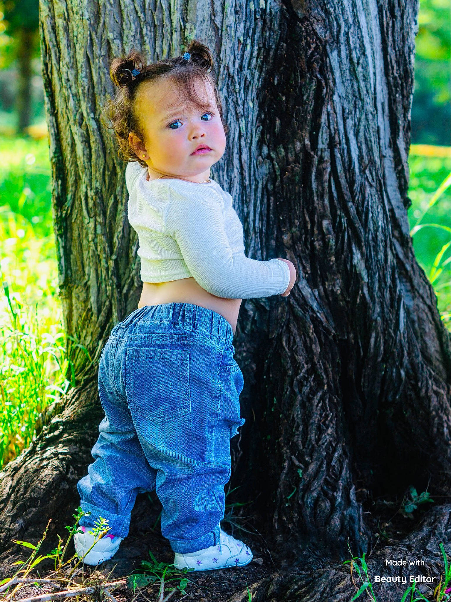 Allison is registered to the contest to win money with this photo: botany, branch, clothing, denim, forest, grass, green, happy, jeans, leaf, leisure, people_in_nature, person, plant, t_shirt, terrestrial_plant, tree, trunk, wood, woody_plant