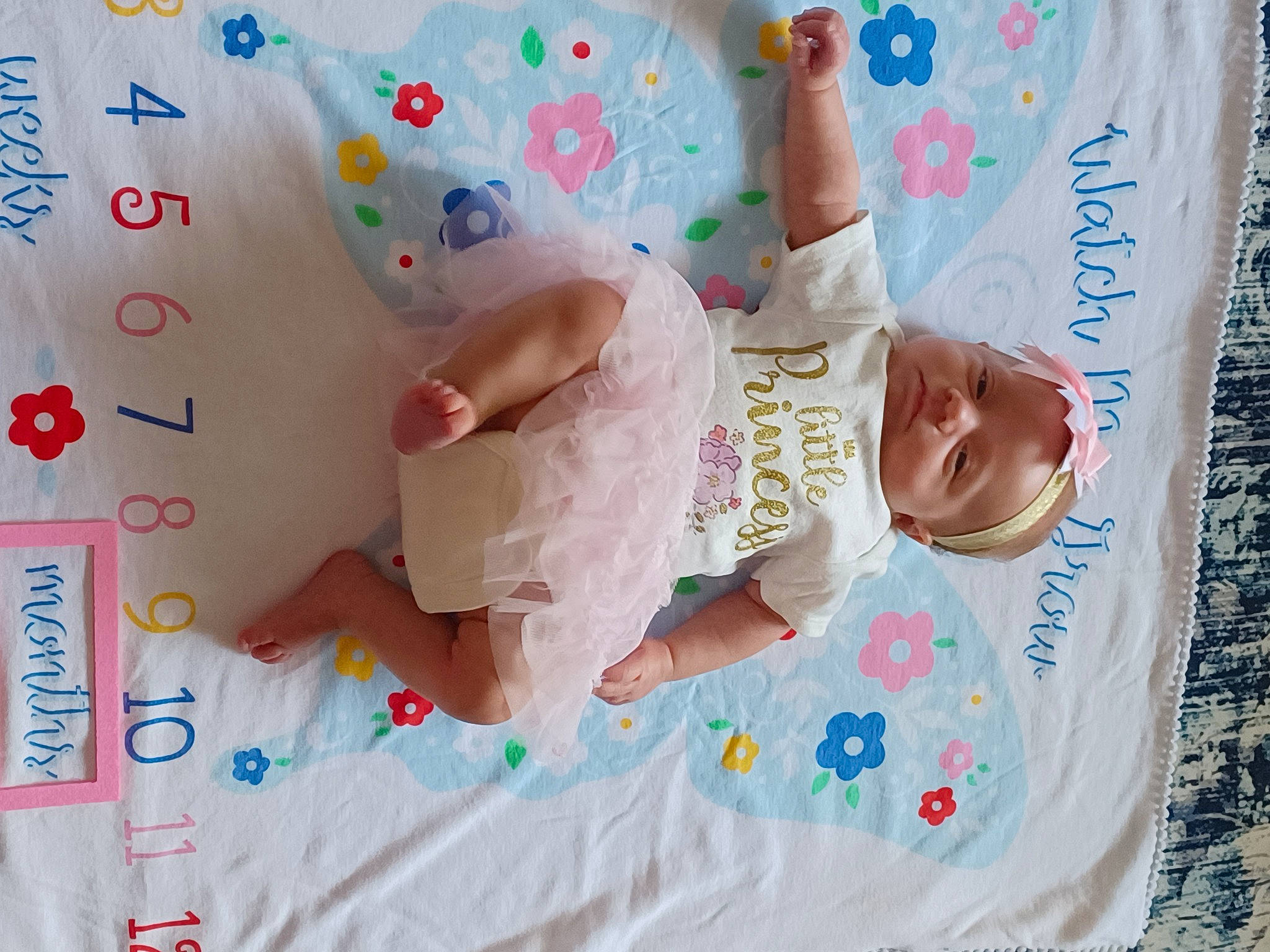 Coralynn is registered to the contest to win money with this photo: art, baby, baby_products, baby_toddler_clothing, child, event, fun, happy, leisure, linens, party_supply, pattern, person, pink, play, room, toddler, visual_arts