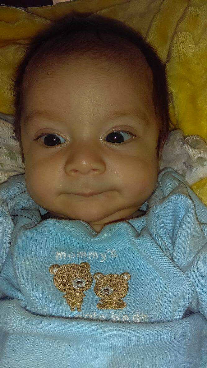 Nicholas is registered to the contest to win money with this photo: baby, cheek, child, chin, eye, face, forehead, head, iris, lip, mouth, nose, person, skin, smile, toddler