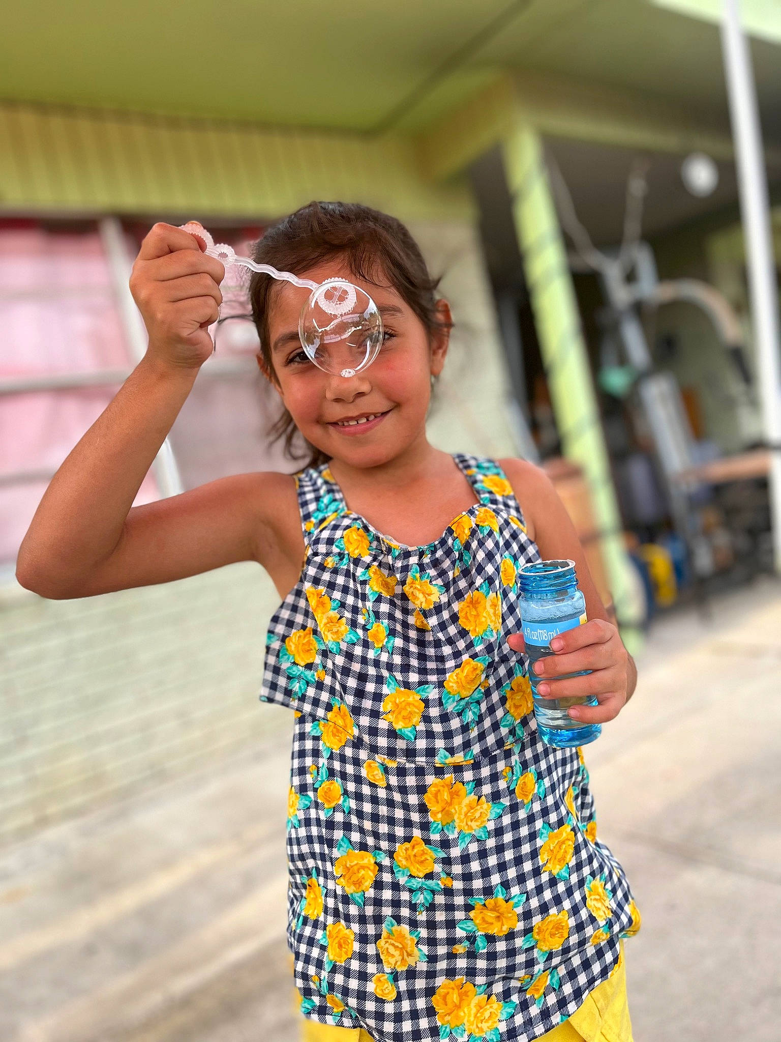 Leah is registered to the contest to win money with this photo: baby_toddler_clothing, child, eye, eyewear, face, fashion_design, finger, fun, gesture, happy, head, human, joy, leisure, pattern, person, sleeve, smile, street_fashion, t_shirt