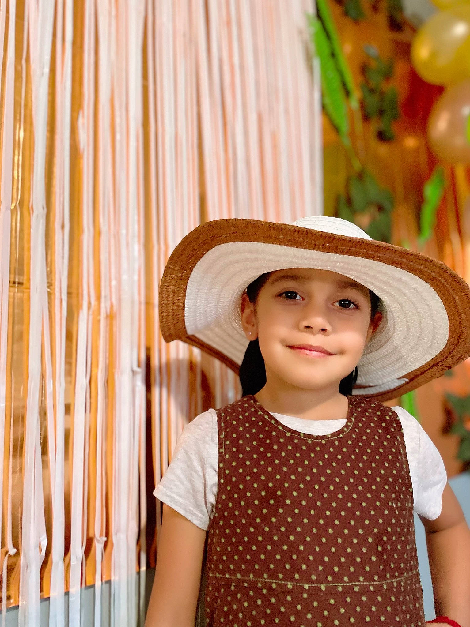 Leah is registered to the contest to win money with this photo: baby_toddler_clothing, beauty, child, event, fashion_accessory, fun, happy, hat, head, headgear, headwear, joy, neck, pattern, people, person, sleeve, smile, sun_hat, toddler