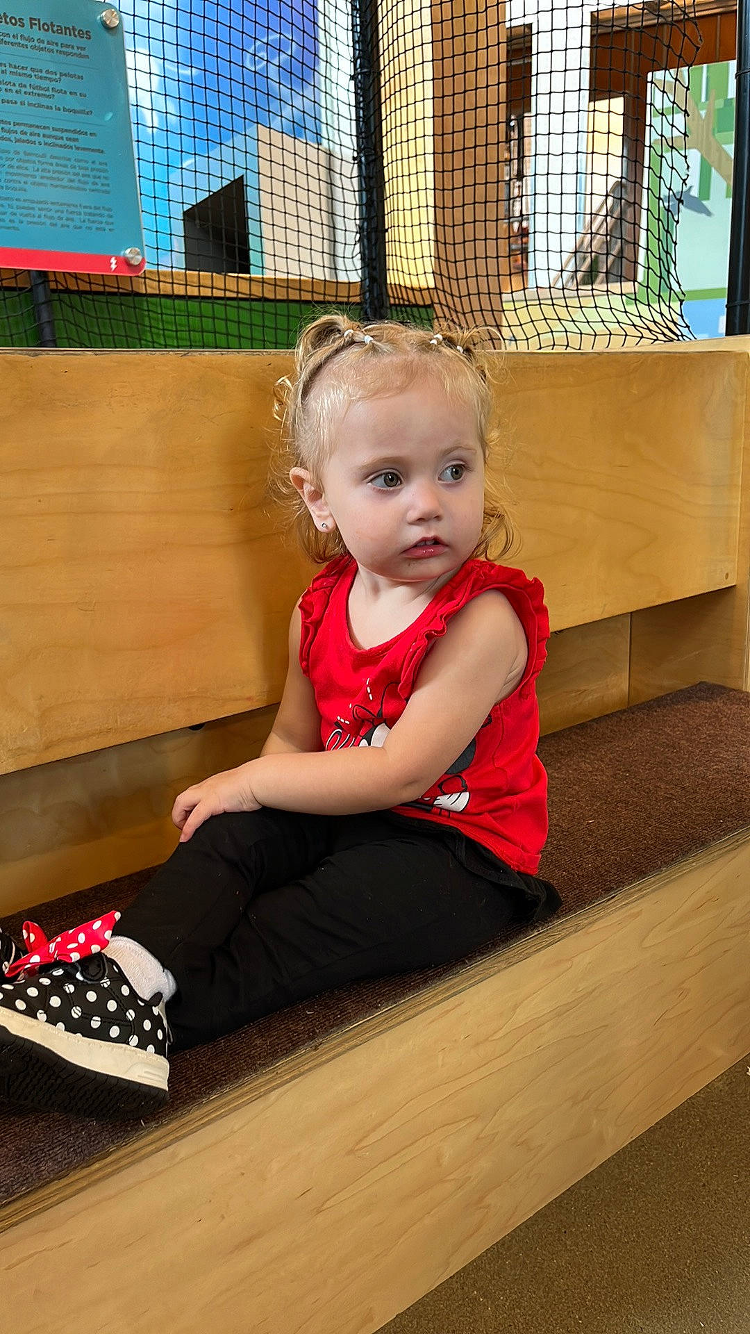 Shamaya is registered to the contest to win money with this photo: baby, baby_toddler_clothing, carmine, child, dress, floor, flooring, fun, happy, hardwood, human_leg, knee, leisure, person, room, sitting, sleeve, t_shirt, thigh, toddler