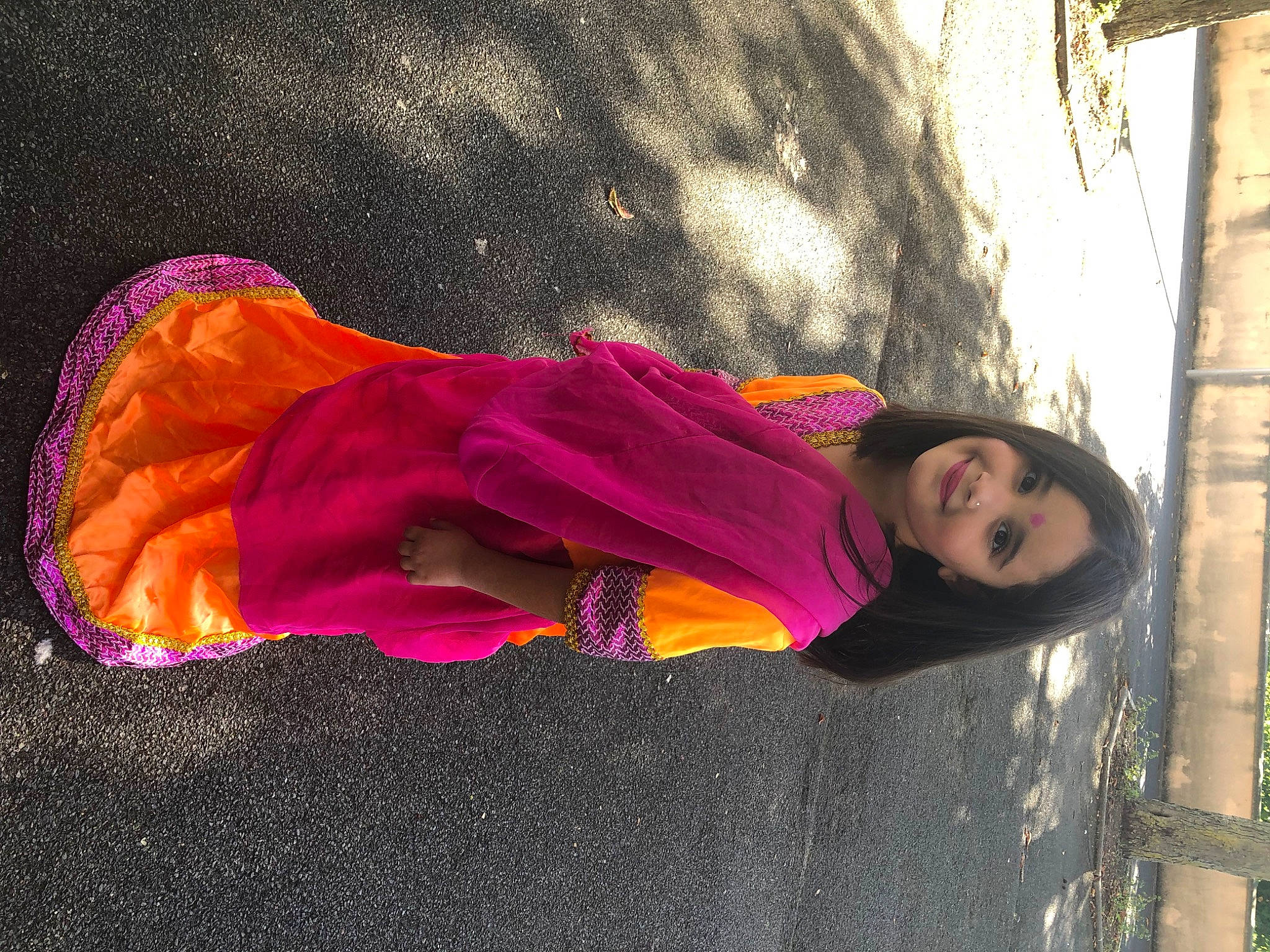 Neila participe au concours pour gagner de l'argent avec cette photo : carmine, flower, fun, glove, grass, human_body, jacket, joy, leaf, leisure, magenta, person, petal, pink, plant, shadow, sitting, tints_and_shades, toddler, tree