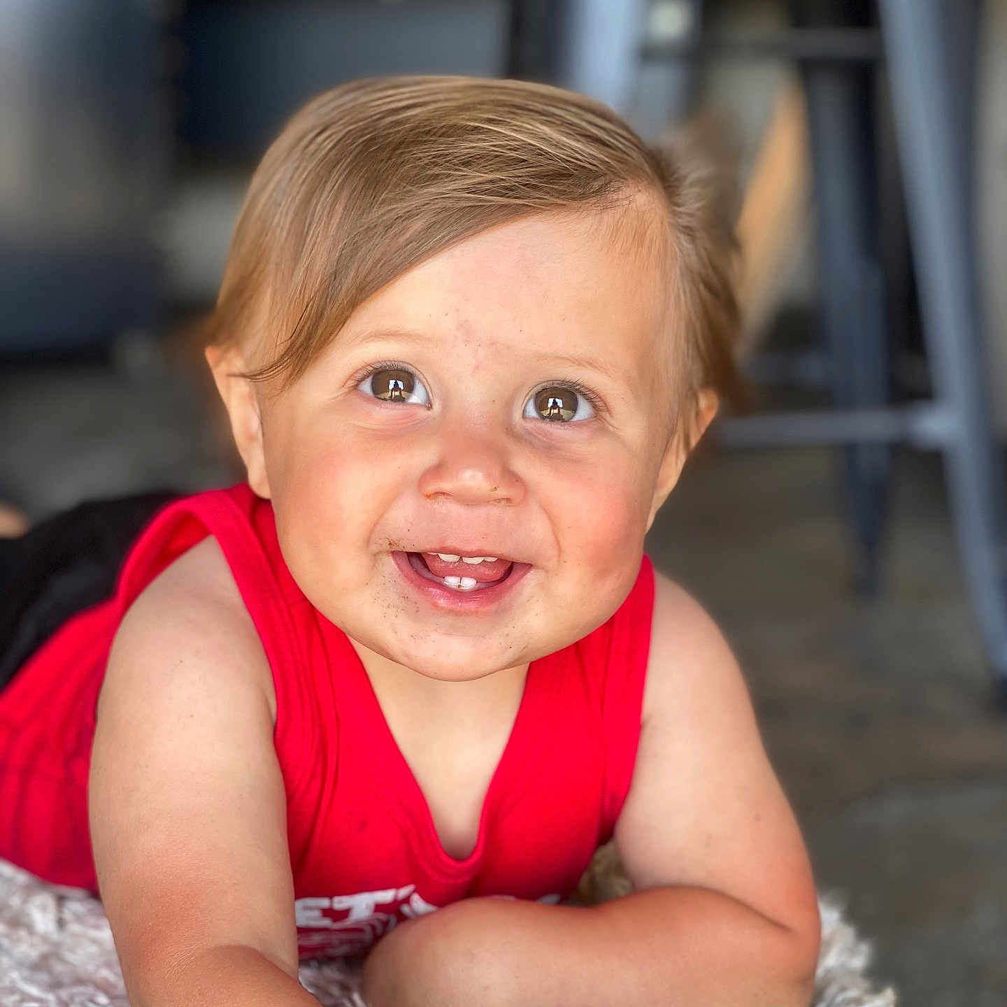 Levi is registered to the contest to win money with this photo: baby, babylaughing, blonde, bodypart, clothing, dress, face, finger, furniture, hand, happy, head, laughing, mouth, person, photography, portrait, sitting, smile, teeth