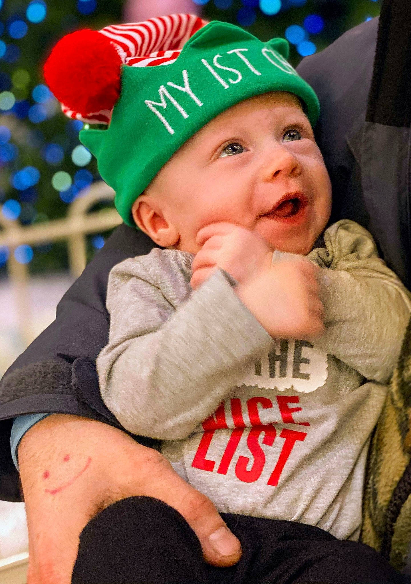 Carter is registered to the contest to win money with this photo: baby, baseball_cap, beanie, cap, child, christmas, fashion_accessory, fictional_character, happy, hat, headgear, headwear, holiday, knit_cap, person, smile, toddler