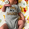 Asher is registered to the contest to win money with this photo: newborn, baby, sleeping, pacifier, infant, child, portrait, indoors, blanket, teddy_bear, onesie, gray_clothing, text_on_clothing, cozy, lying_down, peaceful, close_up, soft_lighting, nursery, family
