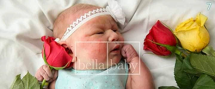 Angelique is registered to the contest to win money with this photo: child, flower, infant, lip, mouth, person, skin