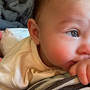 Viola joined the competition — help win amazing prizes! baby, child, closeup, clothing, cozy, crocheted_toy, cute, eyes, fabric, face, hand, indoor, infant, person, pink, portrait, resting, soft, striped, toy