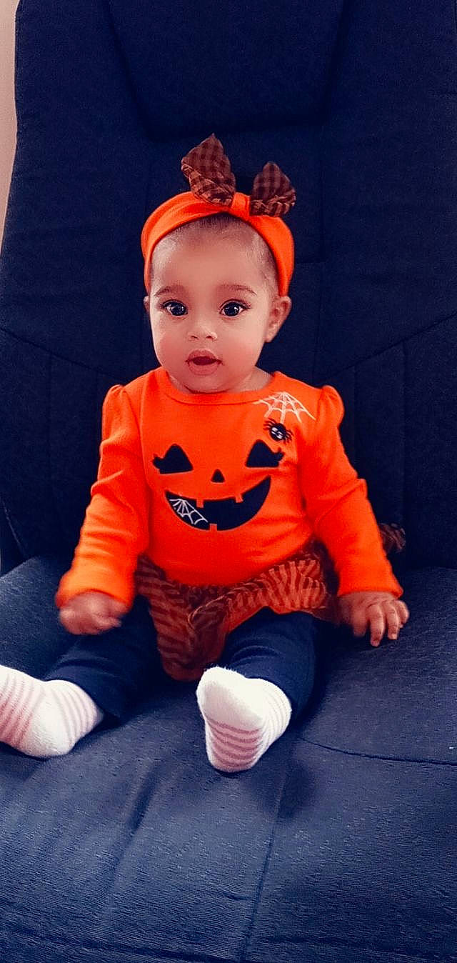 Kaylani Jimenez Perez joined the competition — help win amazing prizes! arm, baby, baby_products, baby_toddler_clothing, cheek, child, fictional_character, finger, flooring, fun, happy, human_body, orange, peach, person, sitting, sleeve, sock, sportswear, t_shirt