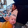 Cassandra joined the competition — help win amazing prizes! baby, man, couch, indoor, relaxing, beard, window_blinds, yellow_clothing, person, furniture, home, curious, infant, casual, seated, portrait, living_room, head, face, hand