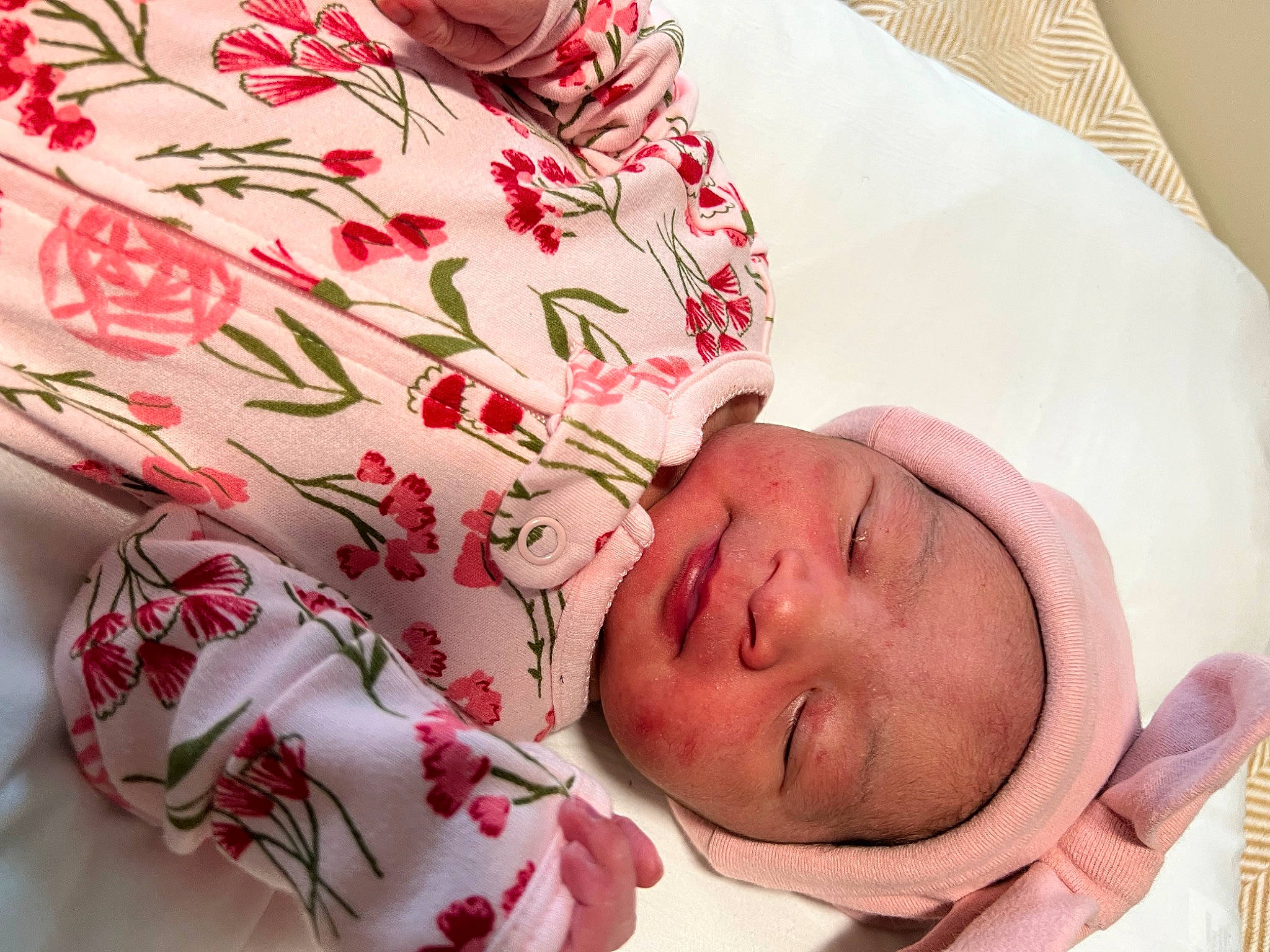 Jupiter is registered to the contest to win money with this photo: baby, baby_sleeping, baby_toddler_clothing, cheek, chest, child, comfort, eyelash, flower, happy, headwear, linens, neck, pattern, peach, person, petal, pink, skin, sleeve