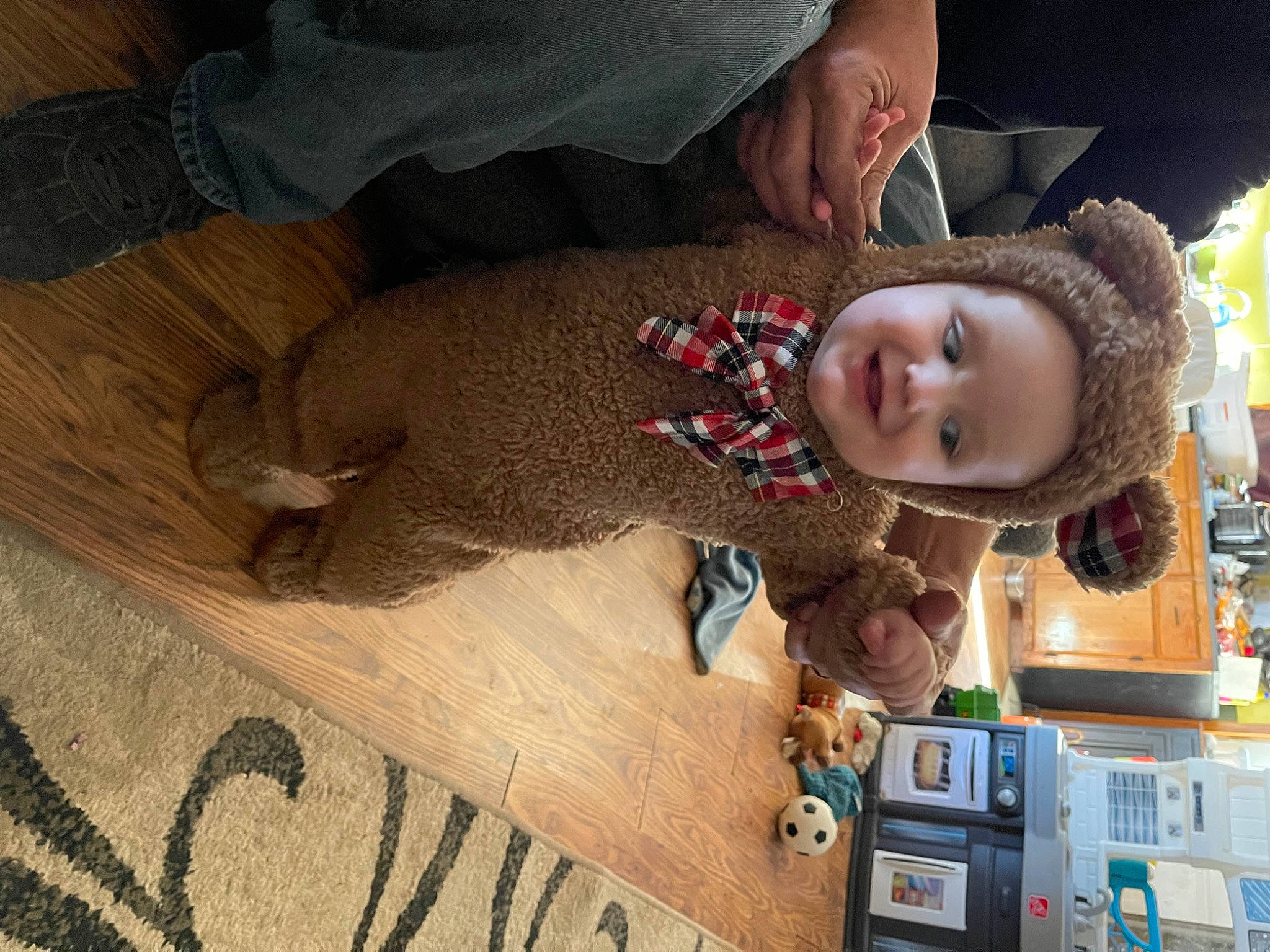 Nico joined the competition — help win amazing prizes! baby, baby_toddler_clothing, child, flooring, fun, fur, happy, hardwood, hat, headwear, joy, person, smile, stuffed_toy, toddler, wood