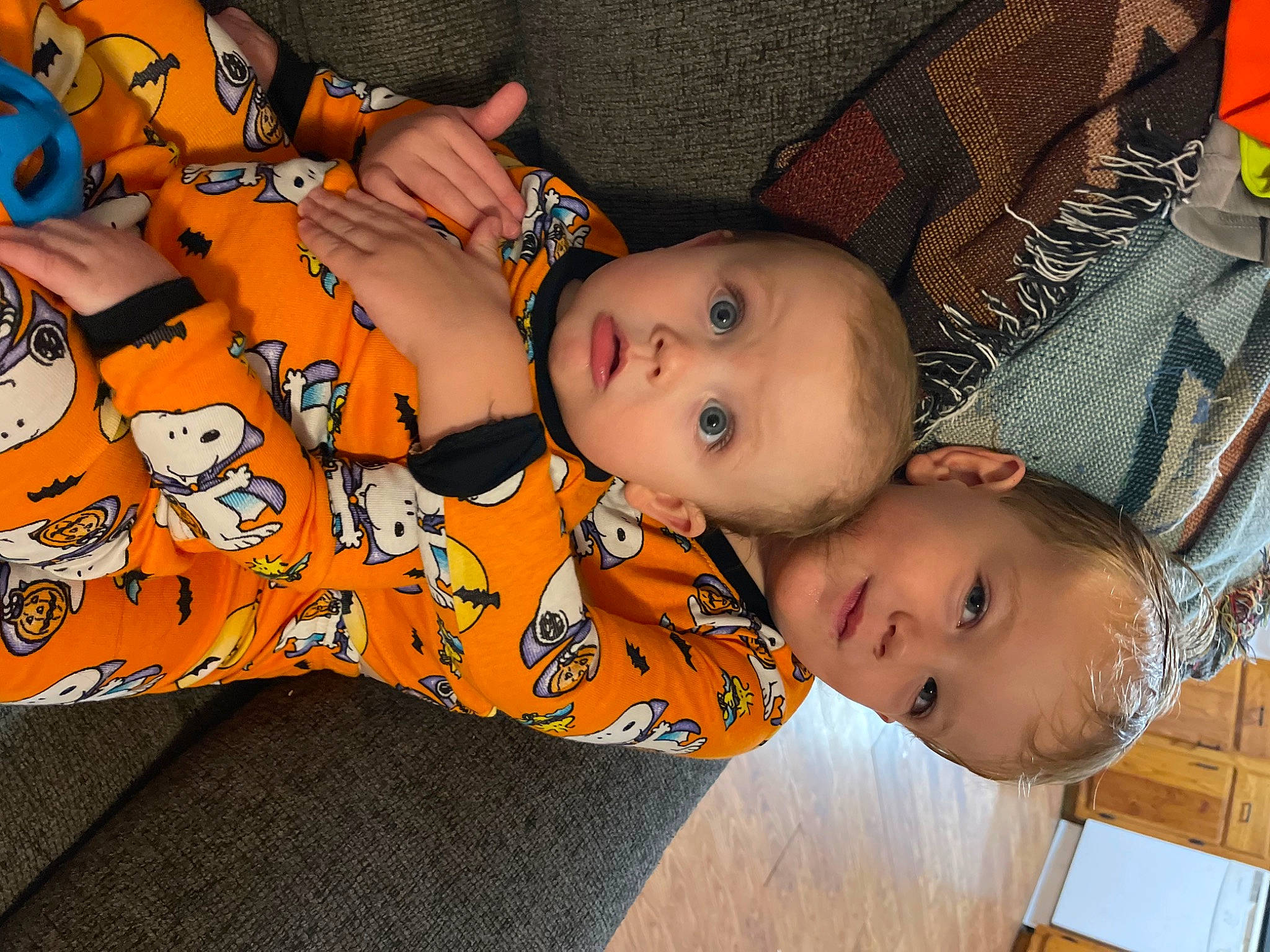 Nico joined the competition — help win amazing prizes! baby, baby_toddler_clothing, brown, cheek, child, chin, flooring, fun, hairstyle, happy, mammal, mouth, nose, orange, pattern, people, person, skin, sleeve, surprise