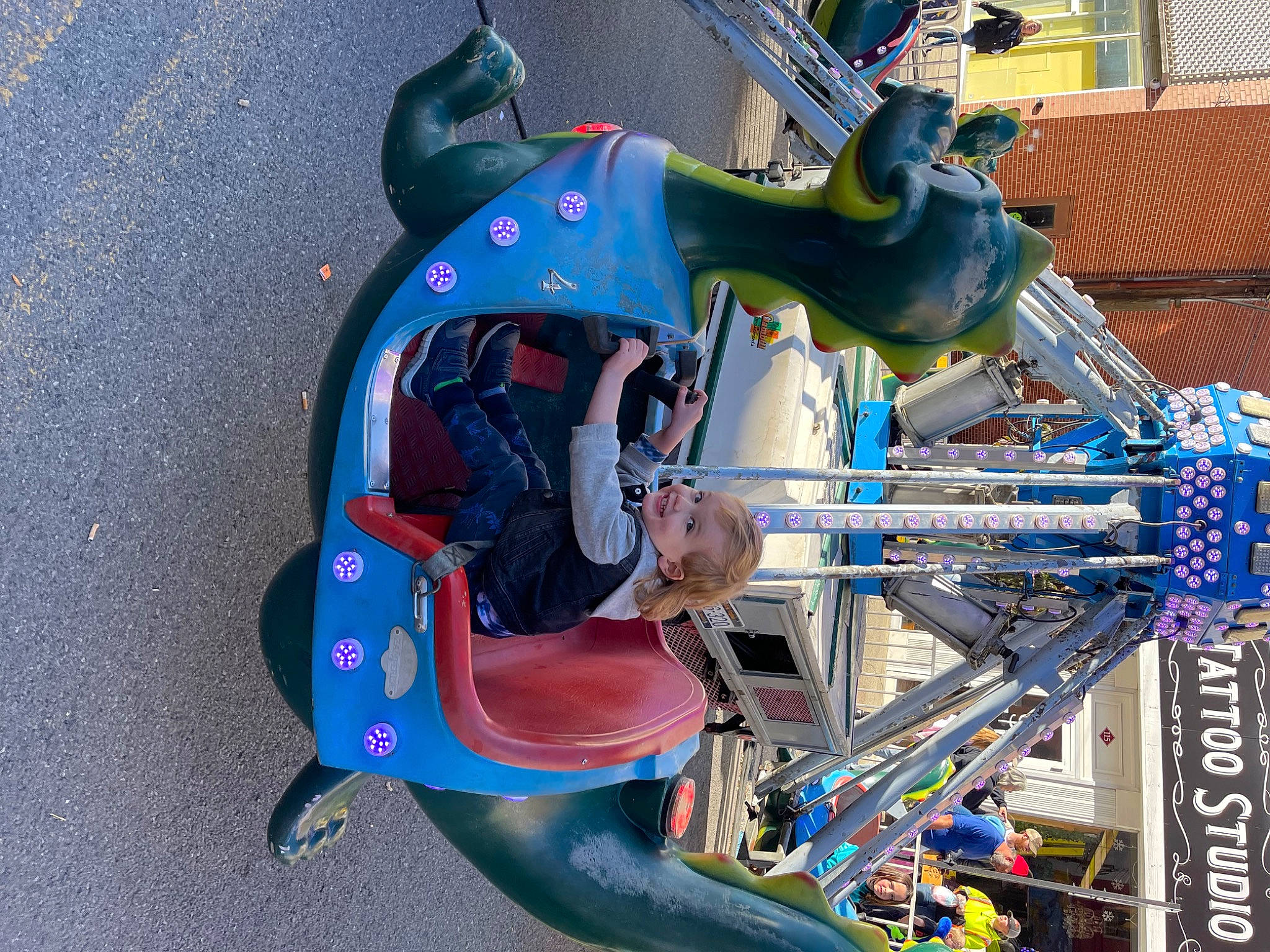 Aidan Swecker joined the competition — help win amazing prizes! amusement_ride, auto_part, automotive_exterior, automotive_wheel_system, blue, electric_blue, engineering, fictional_character, fun, helmet, joy, leisure, machine, motor_vehicle, person, personal_protective_equipment, plastic, recreation, vehicle, window