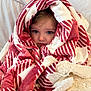 child, blanket, cozy, wrapped, face, blue_eyes, bed, comfort, indoor, cute, warm, fur_texture, portrait, soft, young, person, snuggled, expression, red, white