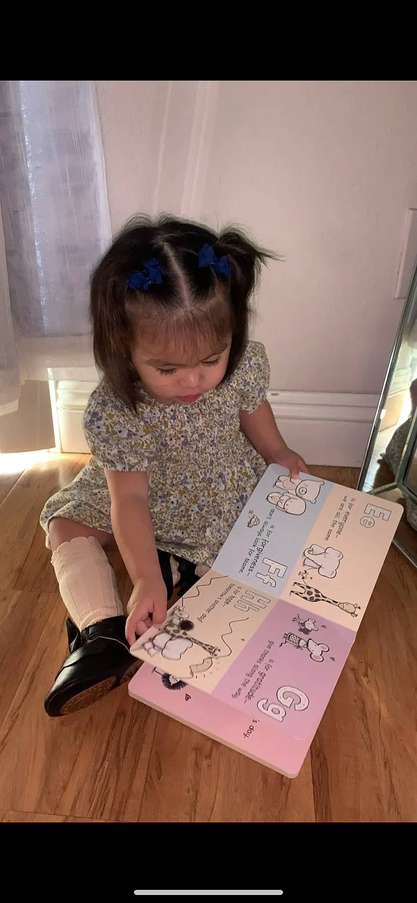 Coraline joined the competition — help win amazing prizes! baby_toddler_clothing, child, flooring, font, fun, handwriting, hardwood, human_leg, magenta, office_supplies, pattern, person, purple, room, sitting, sock, toddler, wood, wood_flooring, wood_stain