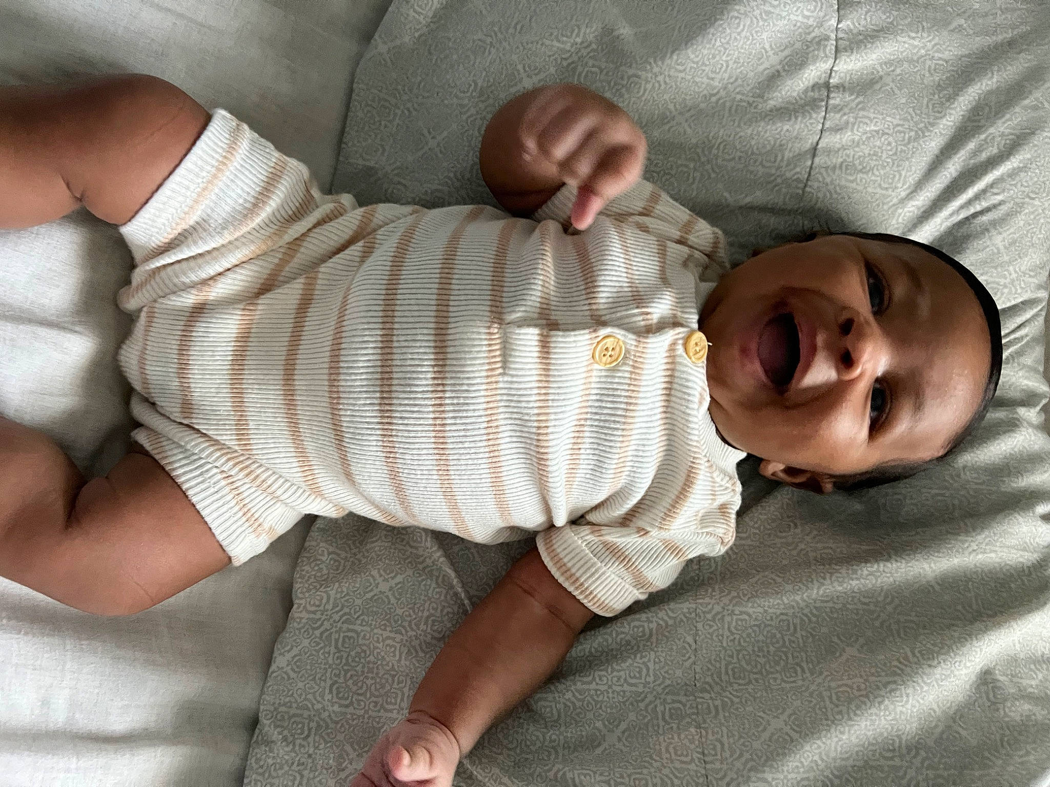 Lennox joined the competition — help win amazing prizes! abdomen, baby, baby_products, baby_toddler_clothing, child, comfort, elbow, finger, gesture, human_body, human_leg, knee, linens, pattern, person, sleeve, smile, sock, thigh, thumb