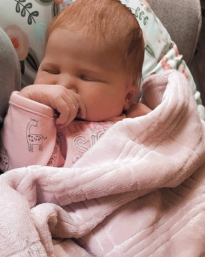 Alannah is registered to the contest to win money with this photo: baby, baby_sleeping, baby_toddler_clothing, cheek, chin, comfort, eyebrow, face, finger, hand, head, lip, mouth, neck, nose, person, pink, skin, sleeve, textile
