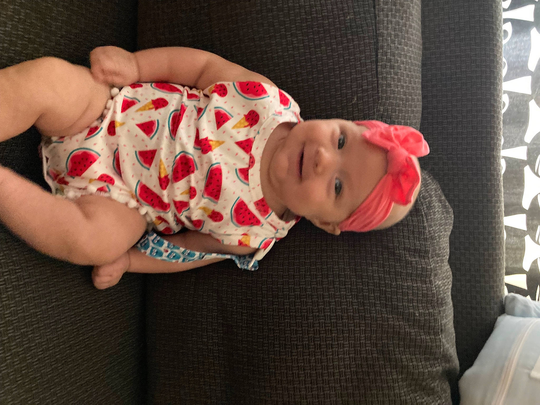 Lucy joined the competition — help win amazing prizes! baby, baby_products, baby_toddler_clothing, cheek, child, comfort, face, hat, headwear, human_body, human_leg, joy, knee, linens, pattern, person, skin, sleeve, smile, sock