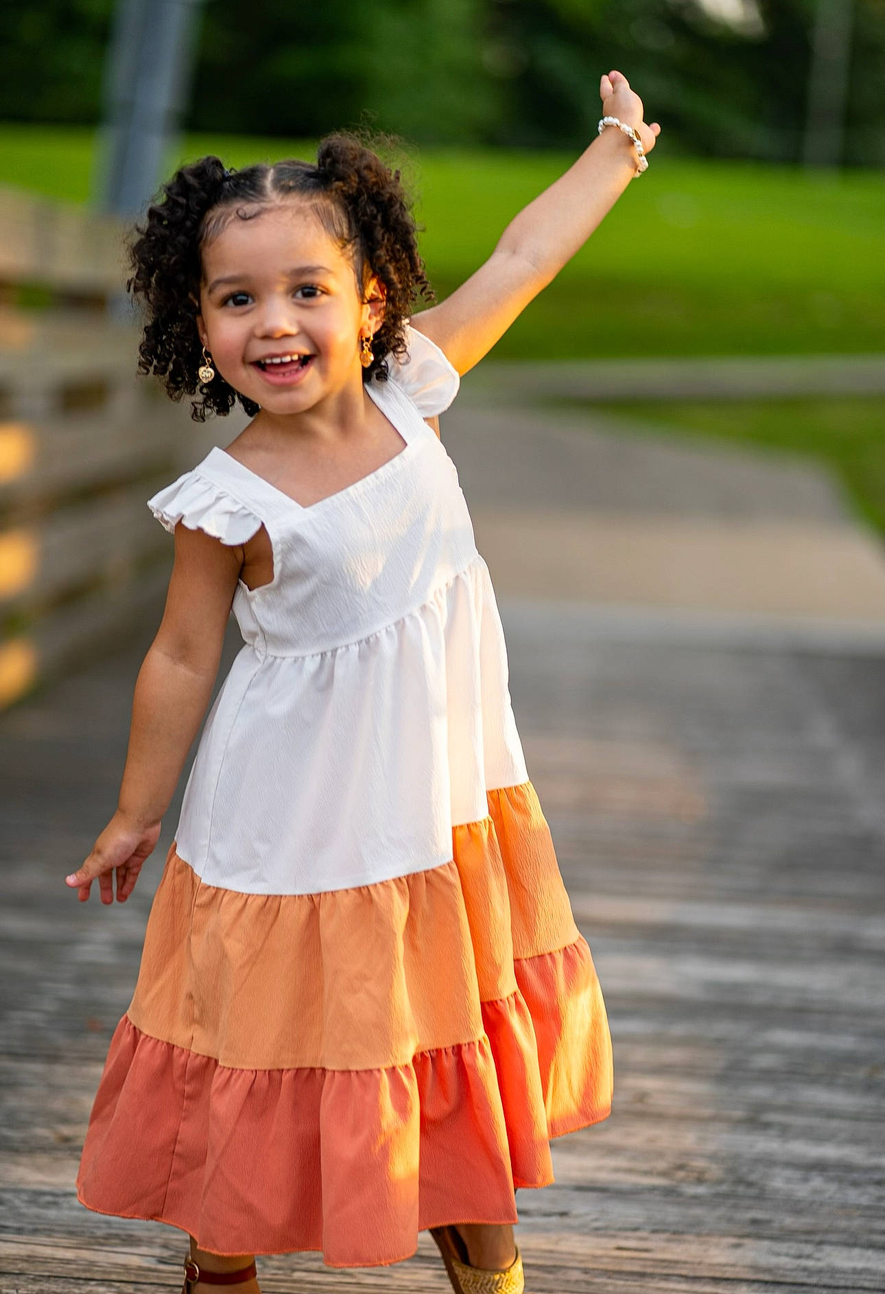 Rylee joined the competition — help win amazing prizes! child, dress, entertainment, event, face, fun, gesture, grass, happy, joy, leisure, orange, peach, people_in_nature, performing_arts, person, public_event, recreation, ruffle, smile