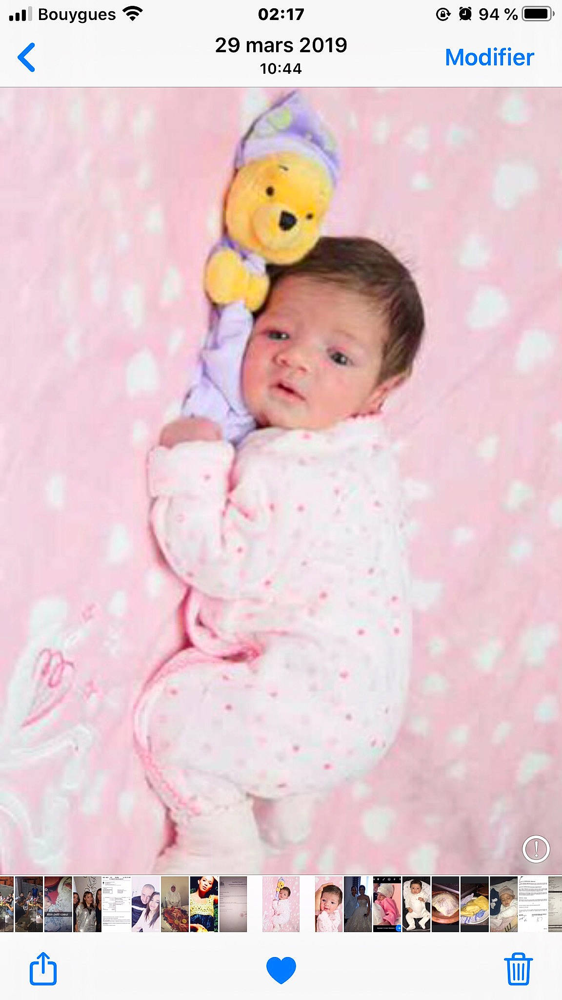 élyne a rejoint le concours — aidez-le/la à gagner de superbes lots ! baby, baby_products, baby_toddler_clothing, cheek, child, design, font, happy, linens, magenta, pattern, peach, person, pink, portrait_photography, sitting, sleeve, textile, toddler, white