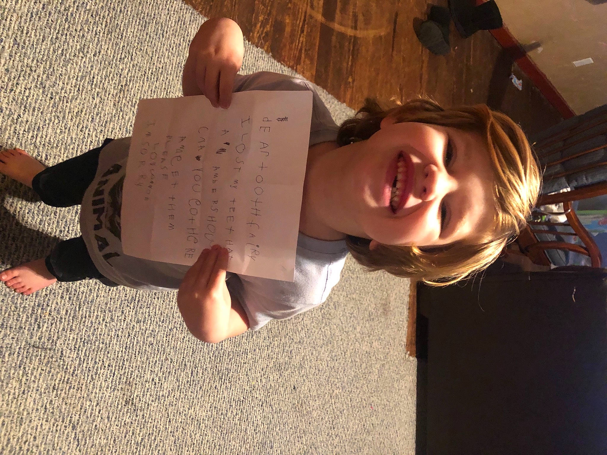 Connor joined the competition — help win amazing prizes! child, eyewear, finger, flooring, font, fun, handwriting, happy, human_body, human_leg, joy, knee, leisure, paper, person, reading, sitting, smile, thigh, toddler