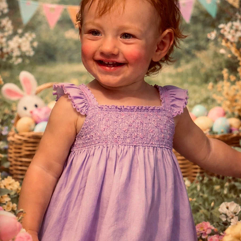 Phoebe is registered to the contest to win money with this photo: child, toddler, smiling, dress, purple_dress, flowers, basket, easter_eggs, plush_toy, bunny, outdoor, spring, celebration, happy, portrait, cute, holiday, nature, colorful, festive