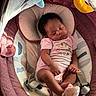 Jahmaika joined the competition — help win amazing prizes! baby, baby_carrier, blanket, canopy, child, curly_hair, cushion, cute, face, footwear, indoor, infant, newborn, onesie, peaceful, pink_clothing, portrait, resting, sleeping, soft_toys
