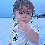 Barron joined the competition — help win amazing prizes! toddler, child, beach, ocean, sand, blue_eyes, wet_hair, white_shirt, floral_pattern, portrait, outdoor, twilight, curious, person, holding, hand, nature, sky, vacation, cute