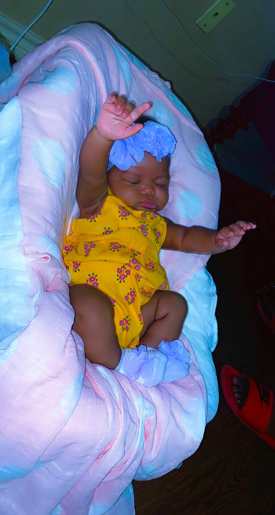 Imani is registered to the contest to win money with this photo: abdomen, baby, baby_products, bedtime, child, comfort, elbow, electric_blue, event, fun, happy, headwear, lap, linens, magenta, pattern, person, purple, room, thigh