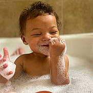 Matias joined the competition — help win amazing prizes! toddler, child, bath, bubbles, foam, happy, smiling, skin, water, bathtub, bathroom, curly_hair, playing, cute, fun, person, indoors, closeup, joy, relaxation