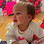 Layla joined the competition — help win amazing prizes! toddler, child, birthday_party, balloons, pink, black, crayon, drawing, table, happy_birthday, celebration, indoor, floor, clothing, hair_bow, person, face, hands, smile, party