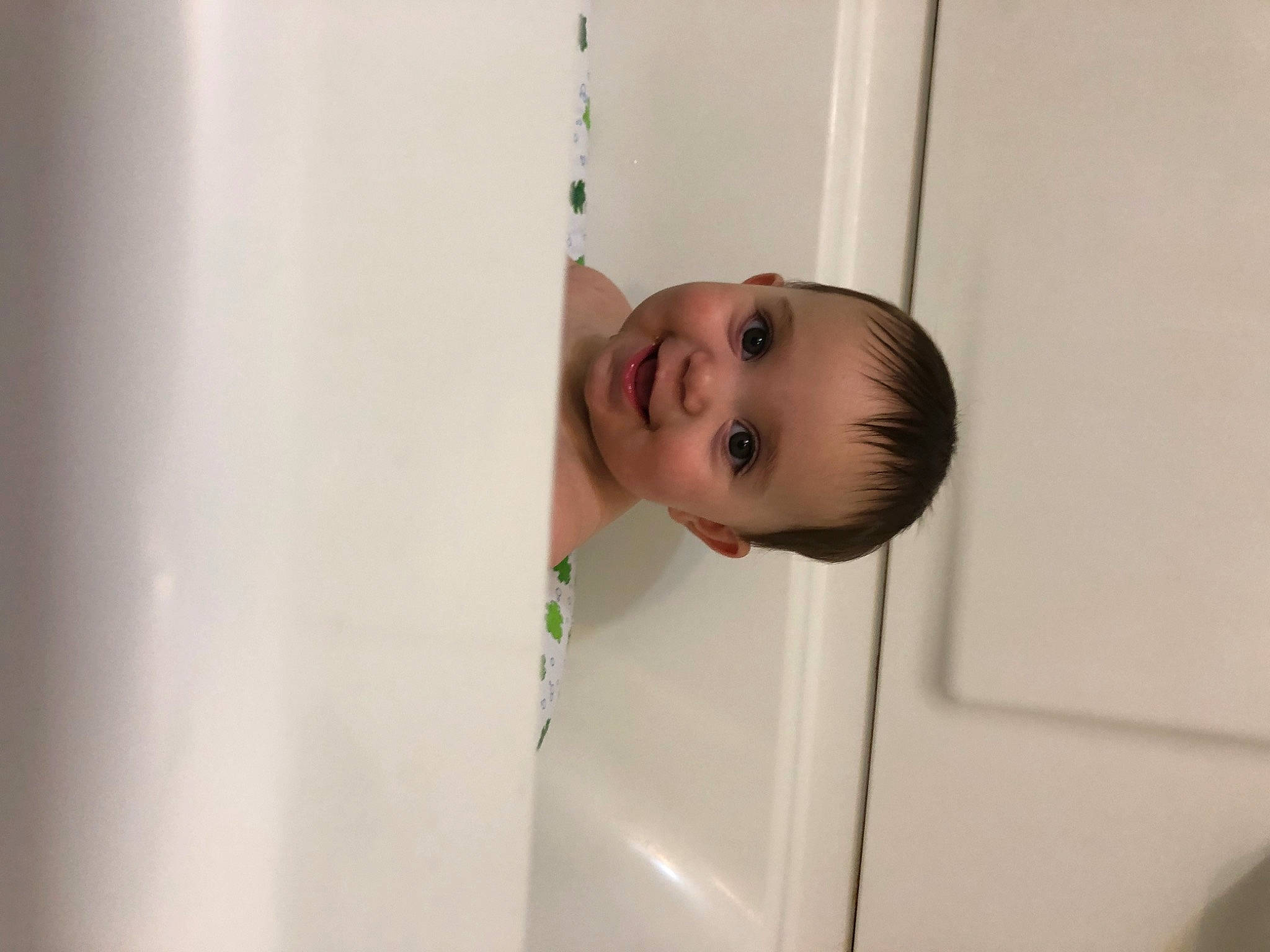 Kennedy is registered to the contest to win money with this photo: baby, baby_products, bathing, ceiling, child, eyelash, facial_expression, flooring, fun, happy, hardwood, joy, person, room, smile, toddler, wood