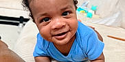 Aireon joined the competition — help win amazing prizes! baby, infant, smiling, blue_shirt, couch, living_room, curtains, window, furniture, person, skin, hand, face, eyes, hair, happy, indoors, child, toddler, home